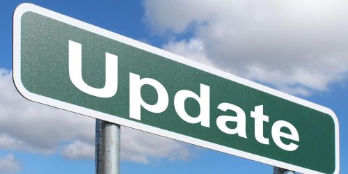 Large green sign saying Update